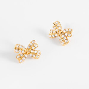 Aretes de moño con baño de oro y cristales
