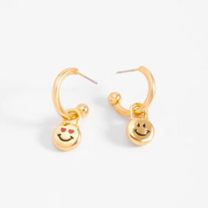 Aretes arracadas con dijes de carita feliz
