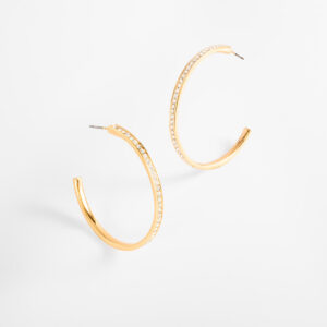 Aretes arracada con baño de oro y cristales.