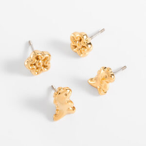 Aretes dúo de poste con diseños de flor y dinosaurio