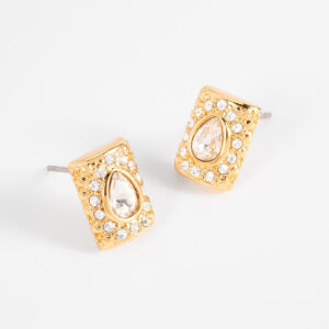 Aretes de botón con baño de oro y cristales.