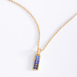 Collar en oro con piedras azul claro y zafiro