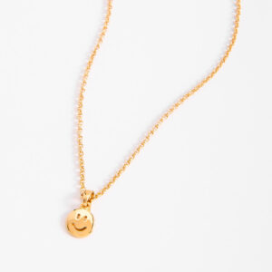 Collar con dije de carita feliz