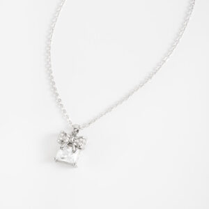Collar con dije de moño y cristal